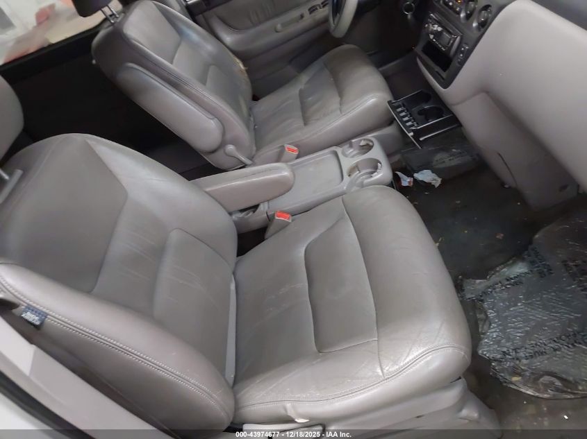 2002 Honda Odyssey Ex-L VIN: 2HKRL18992H573511 Lot: 43974677