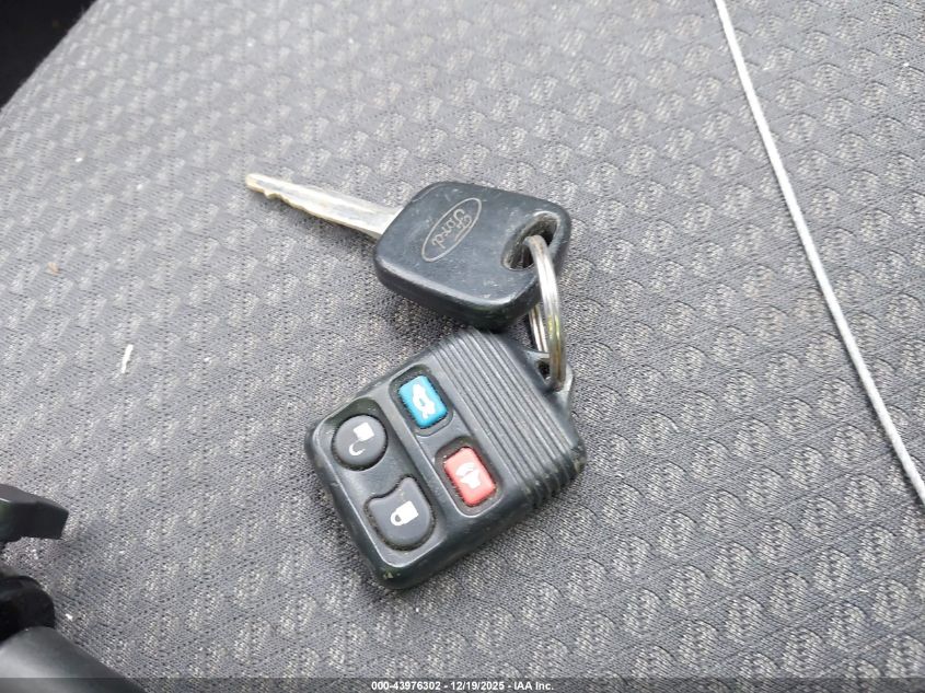 2005 Ford Focus VIN: 3FASP31N45R157285 Lot: 43976302