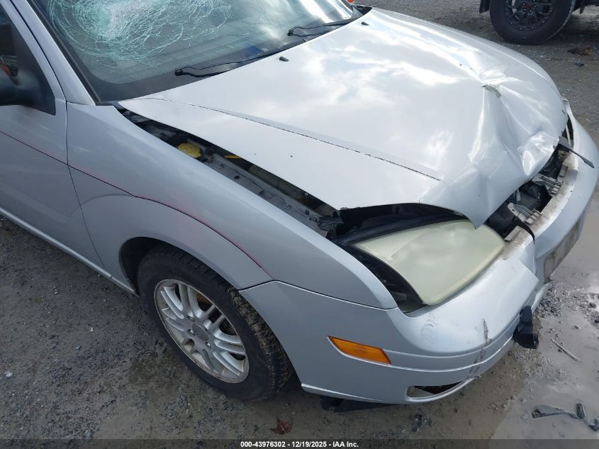 2005 Ford Focus VIN: 3FASP31N45R157285 Lot: 43976302