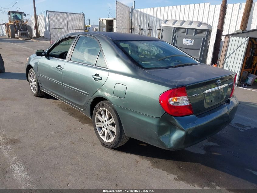 2002 Toyota Camry Le VIN: JTDBE32K420117173 Lot: 43976321