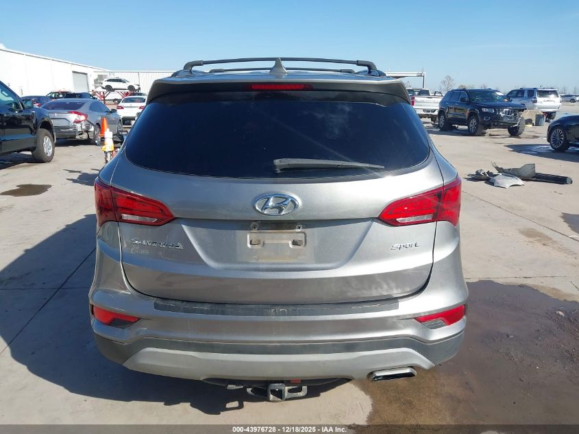 2018 Hyundai Santa Fe Sport 2.4L VIN: 5NMZU3LB2JH104310 Lot: 43976728
