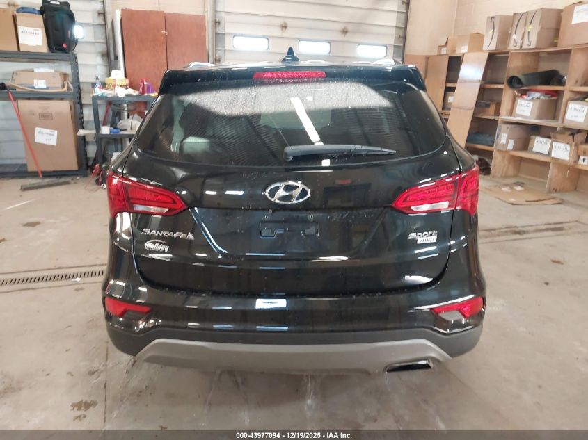 2018 Hyundai Santa Fe Sport 2.4L VIN: 5NMZUDLBXJH063172 Lot: 43977094