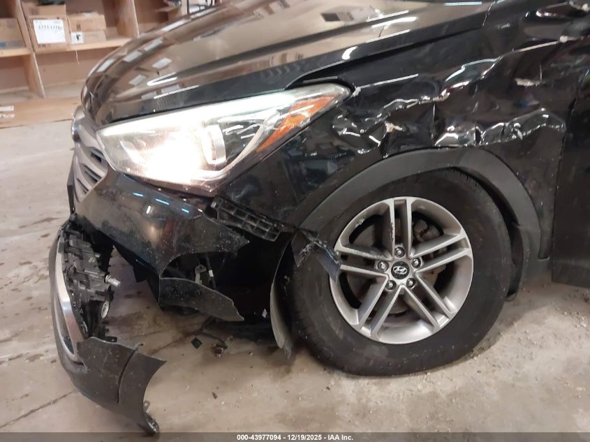 2018 Hyundai Santa Fe Sport 2.4L VIN: 5NMZUDLBXJH063172 Lot: 43977094