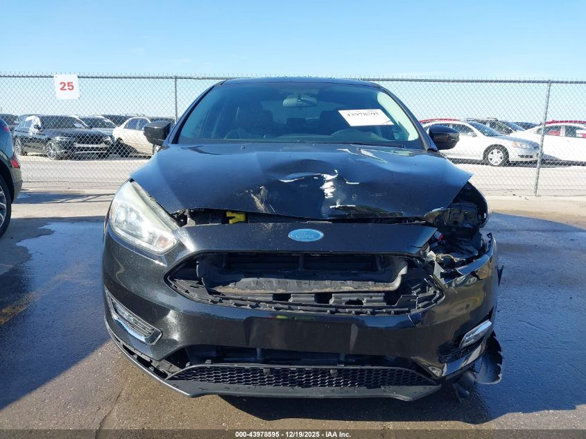 2015 Ford Focus Titanium VIN: 1FADP3J28FL362590 Lot: 43978595