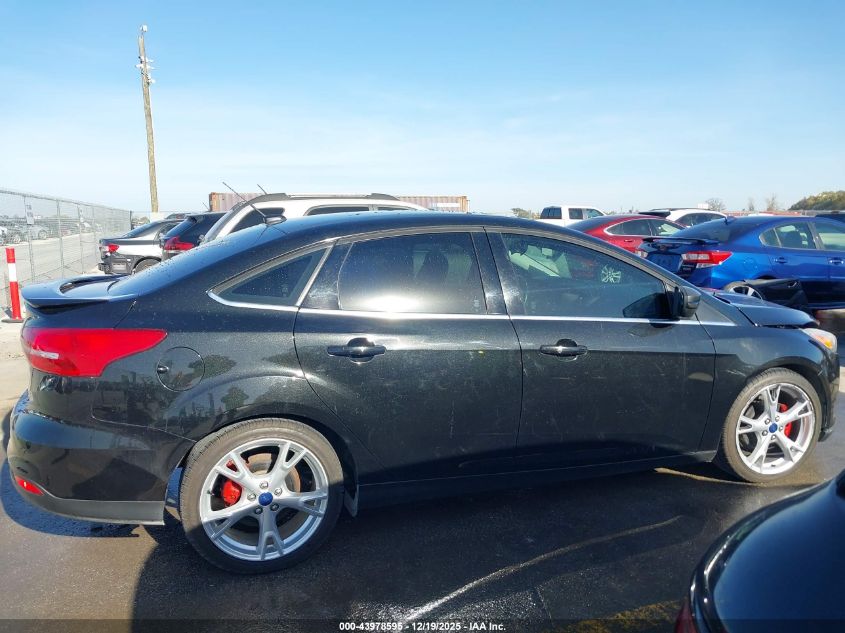 2015 Ford Focus Titanium VIN: 1FADP3J28FL362590 Lot: 43978595
