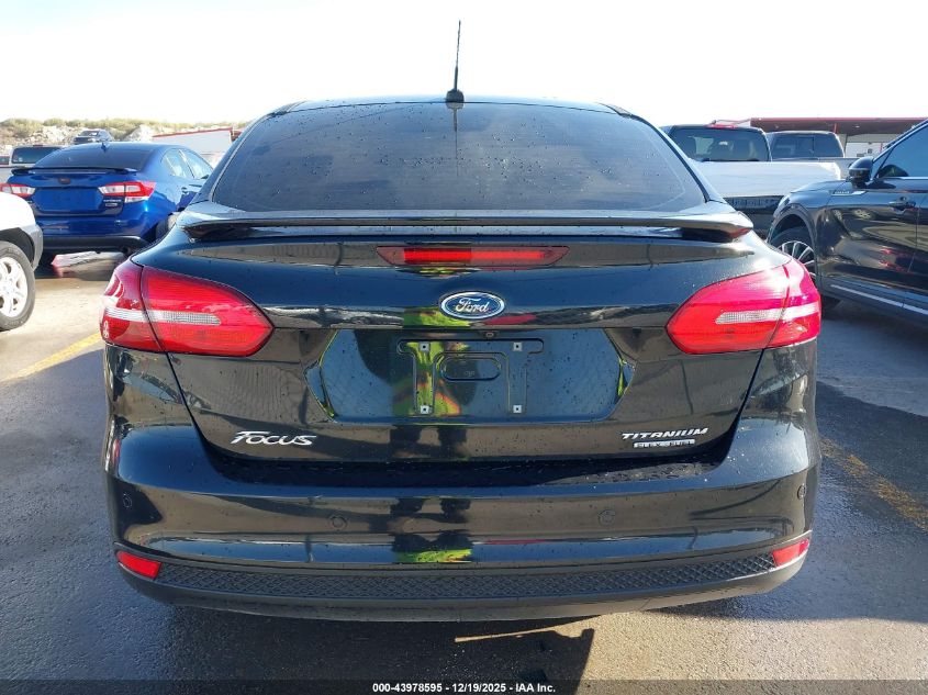 2015 Ford Focus Titanium VIN: 1FADP3J28FL362590 Lot: 43978595