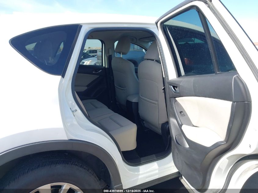 2015 Mazda Cx-5 Touring VIN: JM3KE2CY4F0526882 Lot: 43978599