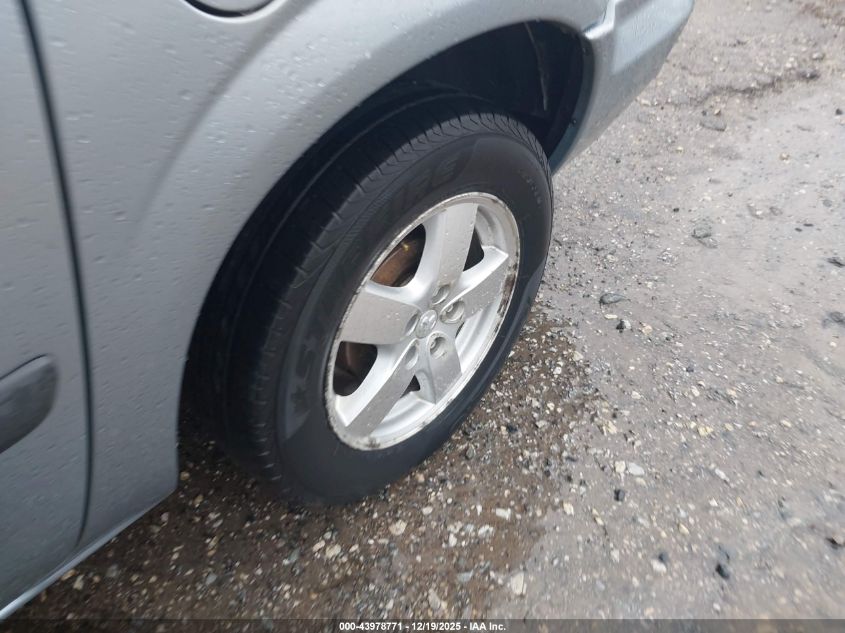 2005 Dodge Caravan Sxt VIN: 1D4GP45R65B253105 Lot: 43978771