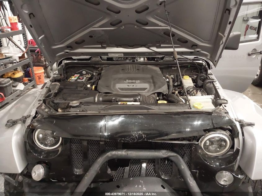 2014 Jeep Wrangler Unlimited Freedom Edition VIN: 1C4BJWDG8EL165414 Lot: 43979071