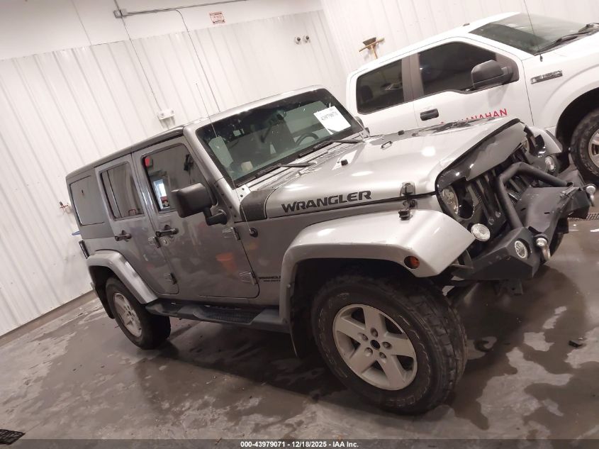 2014 Jeep Wrangler Unlimited Freedom Edition VIN: 1C4BJWDG8EL165414 Lot: 43979071