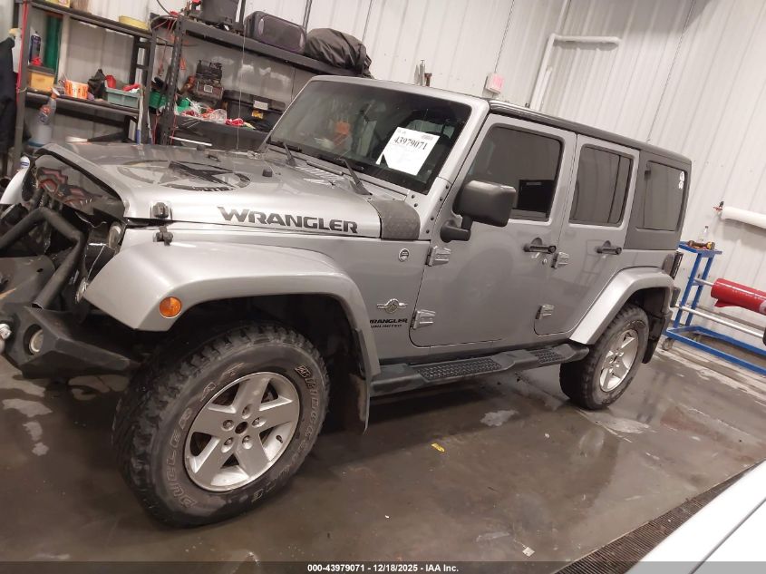 2014 Jeep Wrangler Unlimited Freedom Edition VIN: 1C4BJWDG8EL165414 Lot: 43979071