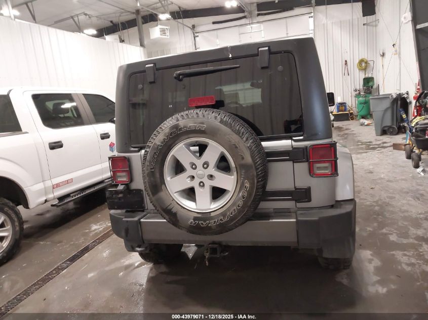 2014 Jeep Wrangler Unlimited Freedom Edition VIN: 1C4BJWDG8EL165414 Lot: 43979071