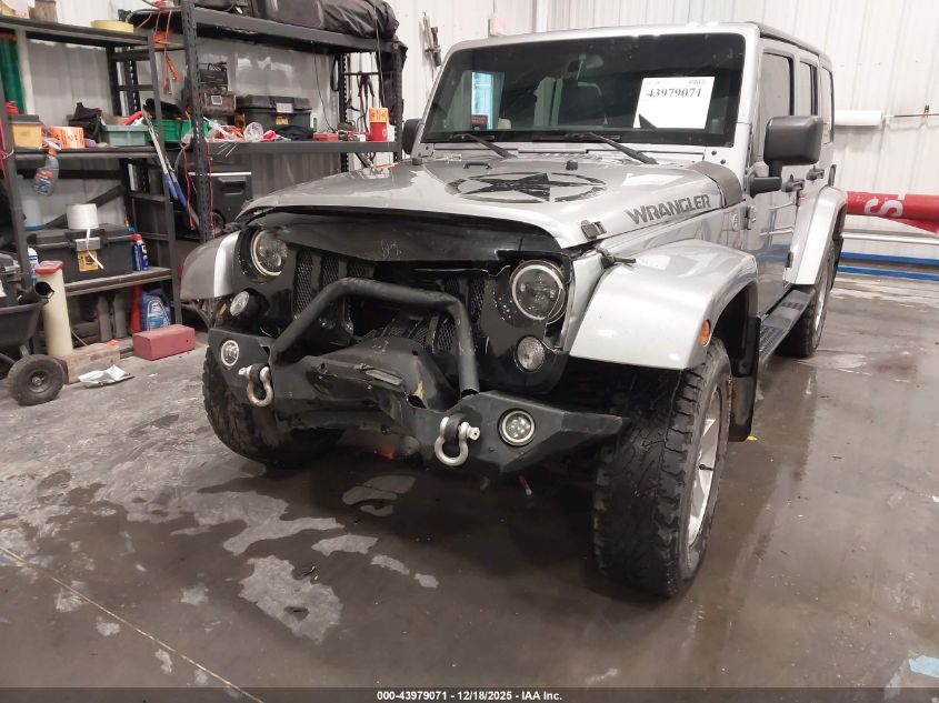 2014 Jeep Wrangler Unlimited Freedom Edition VIN: 1C4BJWDG8EL165414 Lot: 43979071