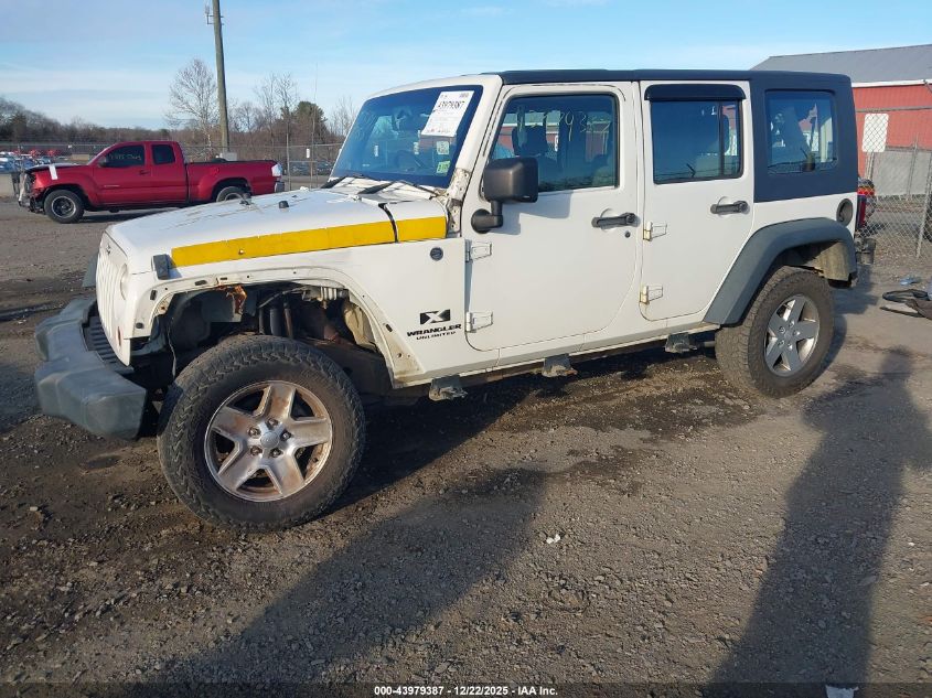 2009 Jeep Wrangler Unlimited X Rhd VIN: 1J4GZ39179L711945 Lot: 43979387