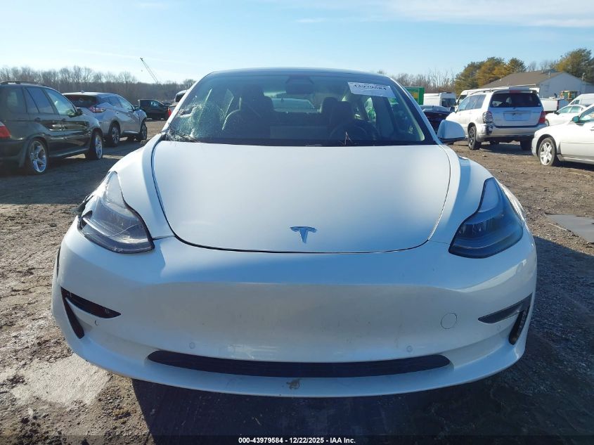 2022 Tesla Model 3 Long Range Dual Motor All-Wheel Drive VIN: 5YJ3E1EB3NF103131 Lot: 43979584