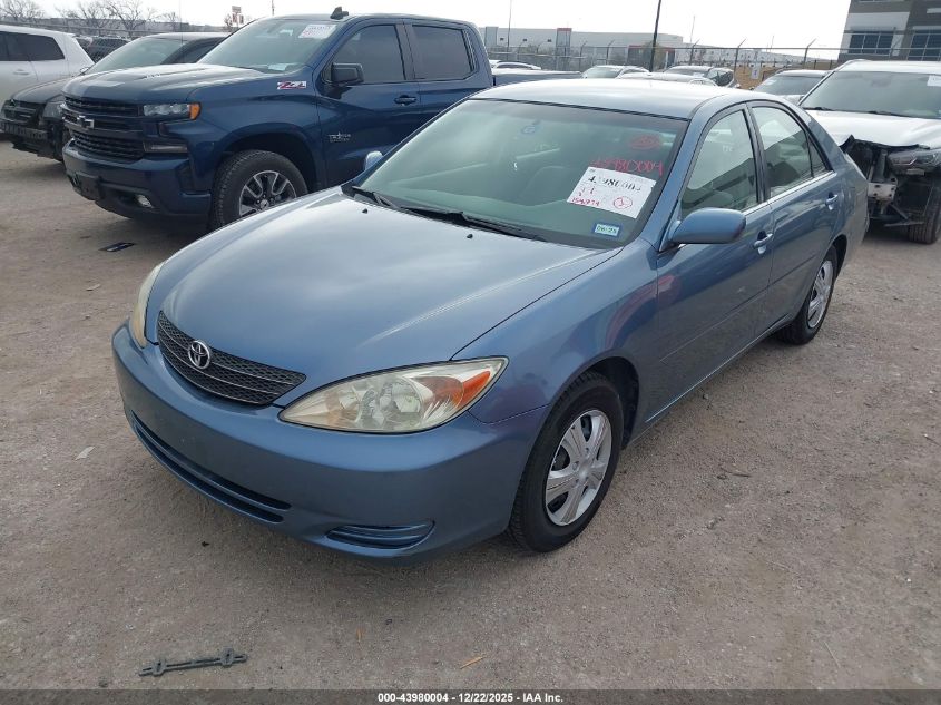 2002 Toyota Camry Le VIN: JTDBE32K220018805 Lot: 43980004
