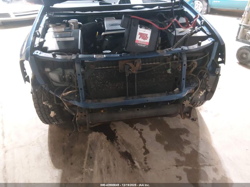 2005 GMC Envoy Slt VIN: 1GKDT13S552140038 Lot: 43980049