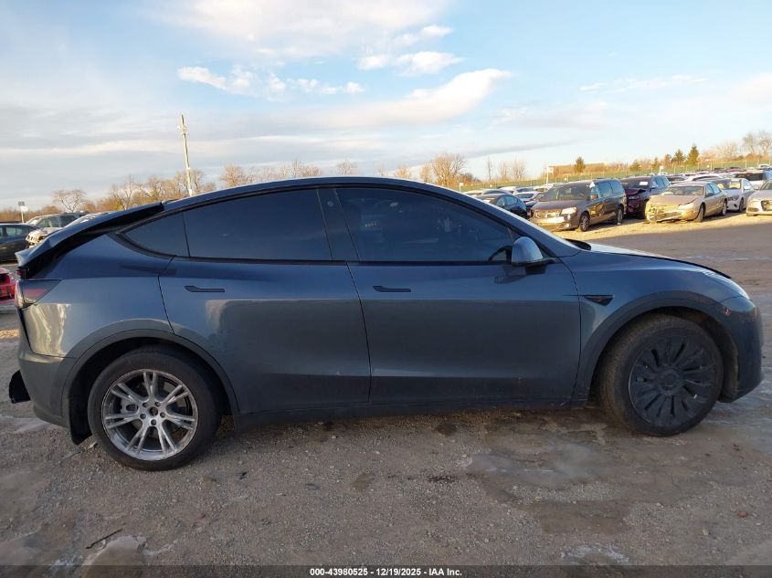 2023 Tesla Model Y Awd/Long Range Dual Motor All-Wheel Drive VIN: 7SAYGDEE4PA041656 Lot: 43980525