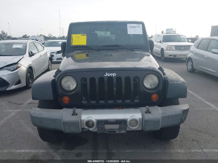 2009 Jeep Wrangler Unlimited Sahara VIN: 1J8GA59129L761167 Lot: 43980732