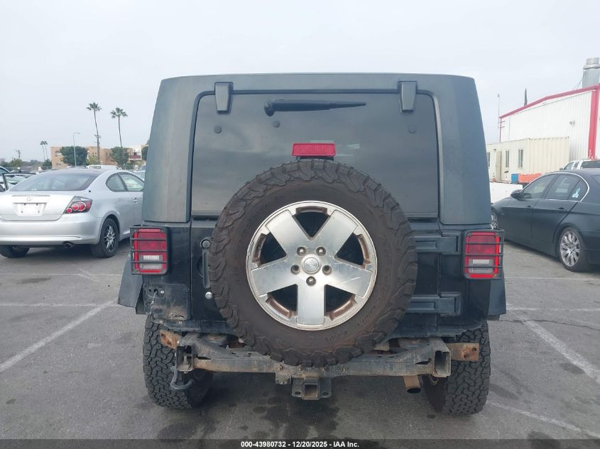 2009 Jeep Wrangler Unlimited Sahara VIN: 1J8GA59129L761167 Lot: 43980732