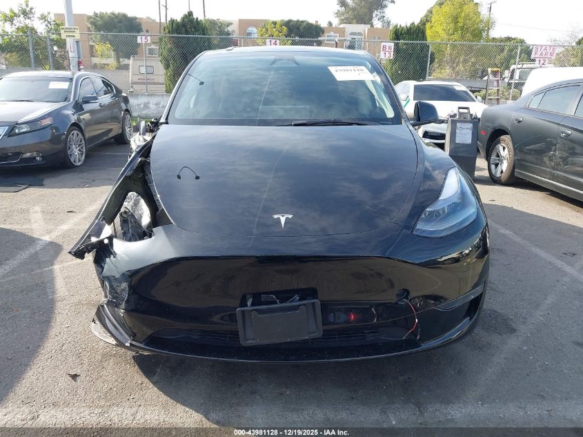 2023 Tesla Model Y Awd/Long Range Dual Motor All-Wheel Drive VIN: 7SAYGDEE2PA167143 Lot: 43981128