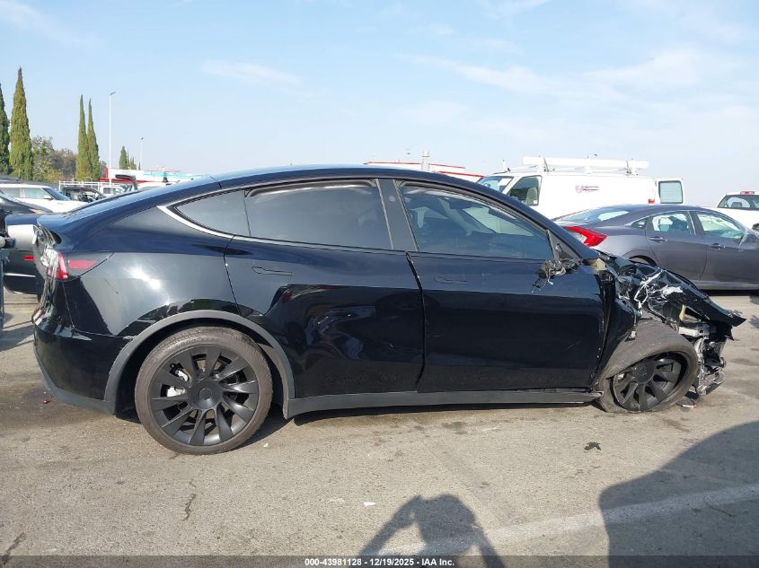 2023 Tesla Model Y Awd/Long Range Dual Motor All-Wheel Drive VIN: 7SAYGDEE2PA167143 Lot: 43981128