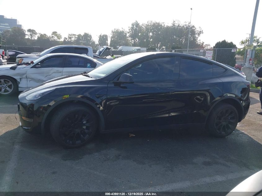 2023 Tesla Model Y Awd/Long Range Dual Motor All-Wheel Drive VIN: 7SAYGDEE2PA167143 Lot: 43981128