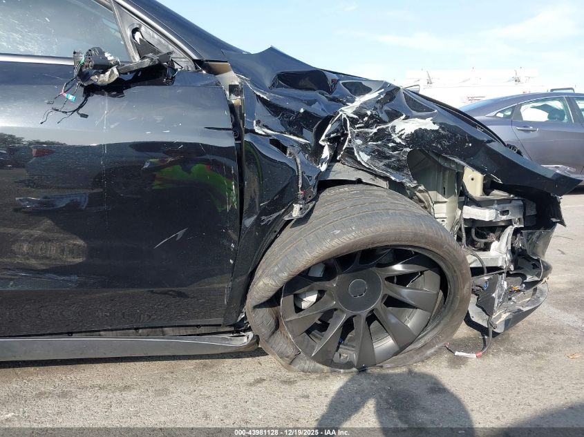 2023 Tesla Model Y Awd/Long Range Dual Motor All-Wheel Drive VIN: 7SAYGDEE2PA167143 Lot: 43981128