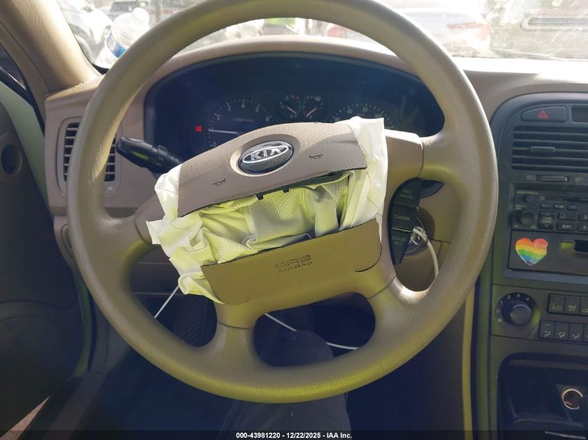 2005 Kia Optima Ex/Lx VIN: KNAGD126255398992 Lot: 43981220