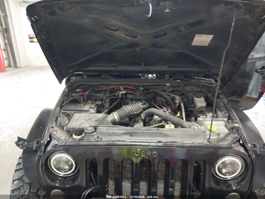 2007 Jeep Wrangler Unlimited Sahara VIN: 1J8GA59117L178344 Lot: 43981812