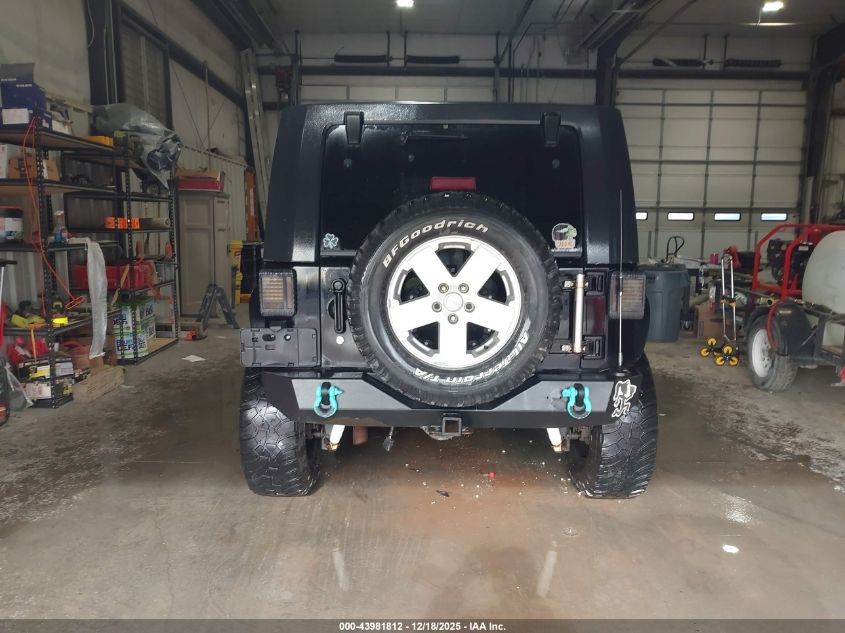 2007 Jeep Wrangler Unlimited Sahara VIN: 1J8GA59117L178344 Lot: 43981812