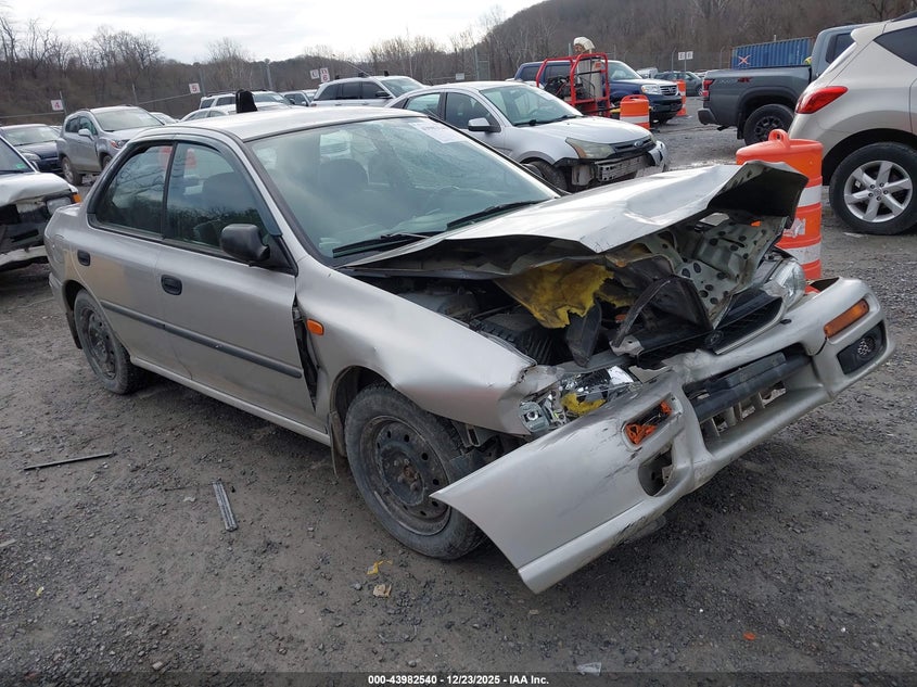 JF1GC4353XH502300 1999 Subaru Impreza L auction photo 1