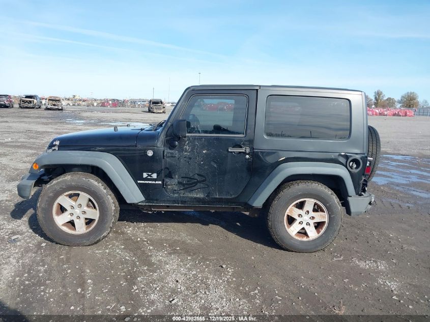 2009 Jeep Wrangler X VIN: 1J4FA24199L710302 Lot: 43982565