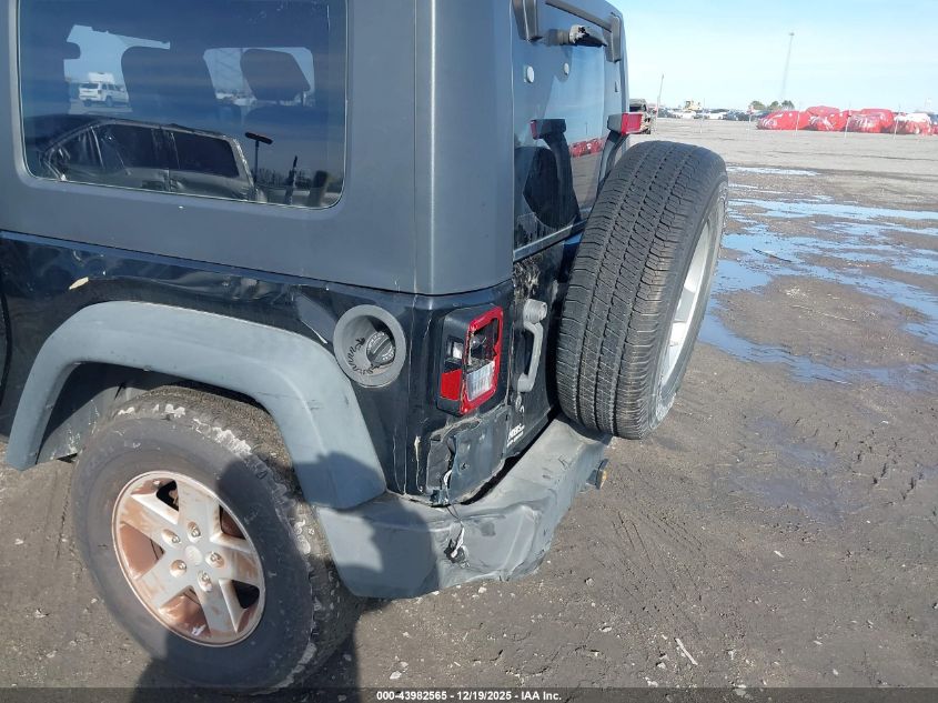 2009 Jeep Wrangler X VIN: 1J4FA24199L710302 Lot: 43982565