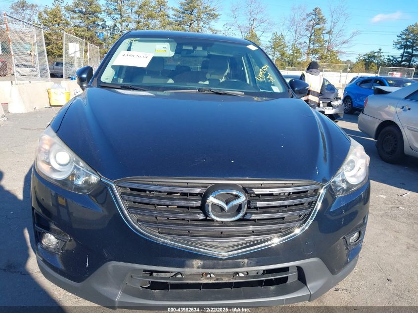 2016 Mazda Cx-5 Touring VIN: JM3KE4CY7G0807779 Lot: 43982634
