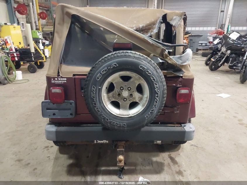 2002 Jeep Wrangler Sahara VIN: 1J4FA59S32P772909 Lot: 43982733