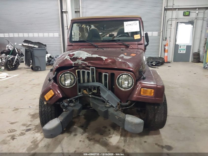 2002 Jeep Wrangler Sahara VIN: 1J4FA59S32P772909 Lot: 43982733