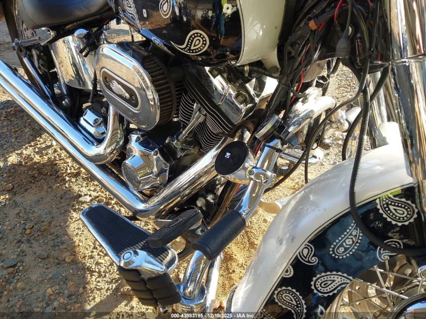 2012 Harley-Davidson Flstn Softail Deluxe VIN: 1HD1JDV19CB040336 Lot: 43983195