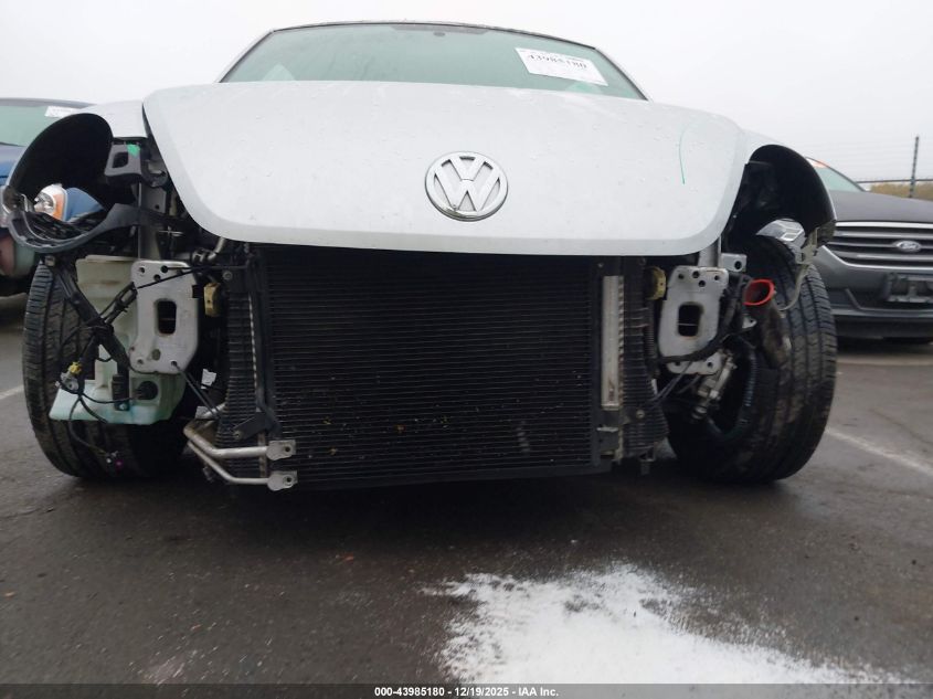 2015 Volkswagen Beetle 1.8T VIN: 3VWJ17AT2FM642581 Lot: 43985180