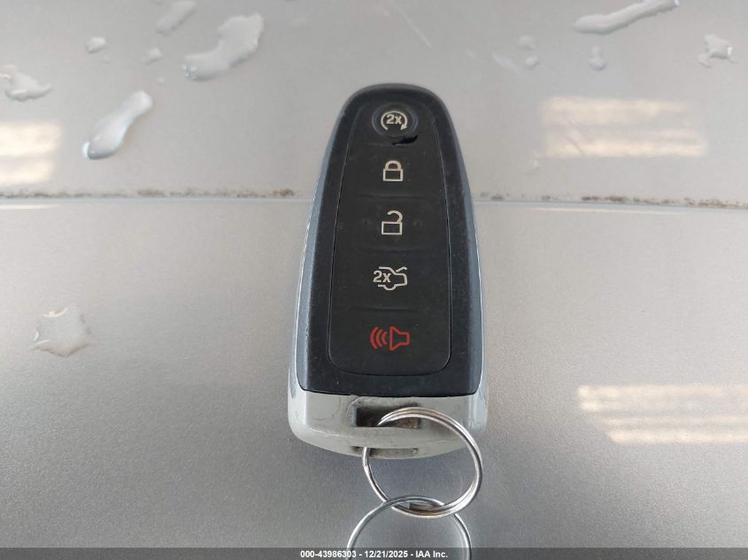 2015 Ford Taurus Limited VIN: 1FAHP2F98FG142912 Lot: 43986303