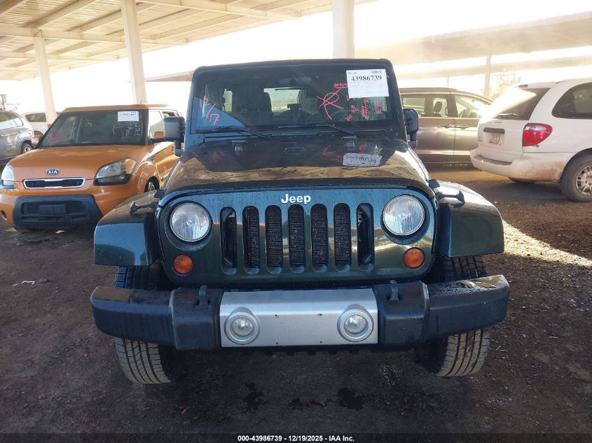 2011 Jeep Wrangler Unlimited Sahara VIN: 1J4BA5H15BL515538 Lot: 43986739
