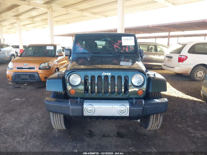 2011 Jeep Wrangler Unlimited Sahara VIN: 1J4BA5H15BL515538 Lot: 43986739
