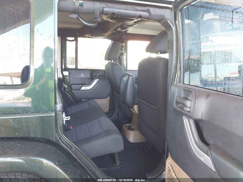 2011 Jeep Wrangler Unlimited Sahara VIN: 1J4BA5H15BL515538 Lot: 43986739