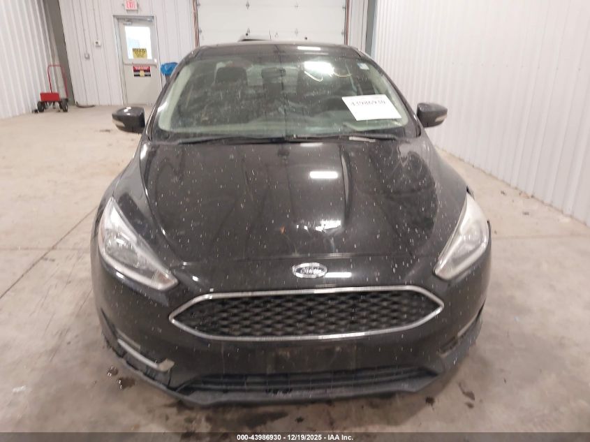 2015 Ford Focus Titanium VIN: 1FADP3J26FL239094 Lot: 43986930