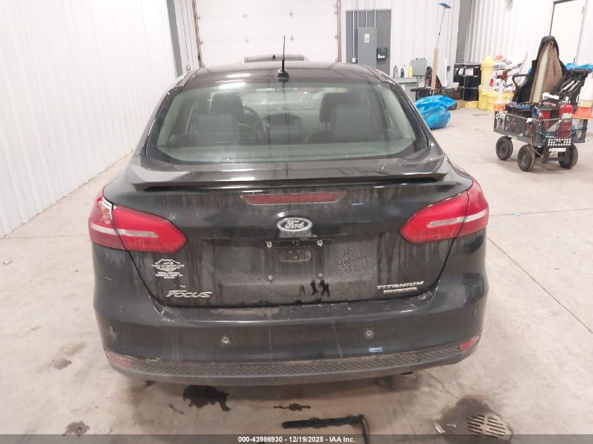 2015 Ford Focus Titanium VIN: 1FADP3J26FL239094 Lot: 43986930