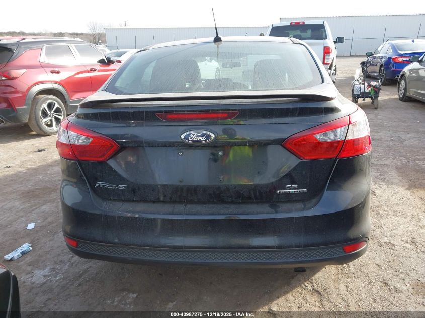 2014 Ford Focus Se VIN: 1FADP3F23EL320142 Lot: 43987275