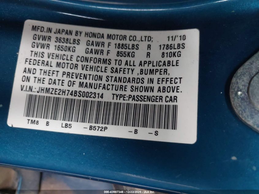 2011 Honda Insight Ex VIN: JHMZE2H74BS002314 Lot: 43987346