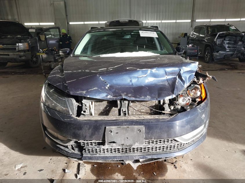 2013 Volkswagen Passat 2.0L Tdi Se VIN: 1VWBN7A39DC054099 Lot: 43987351