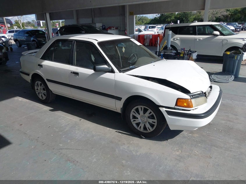 MAZDA PROTEGE 1994. Lot# 43987574. VIN JM1BG2244R0733813. Photo 1