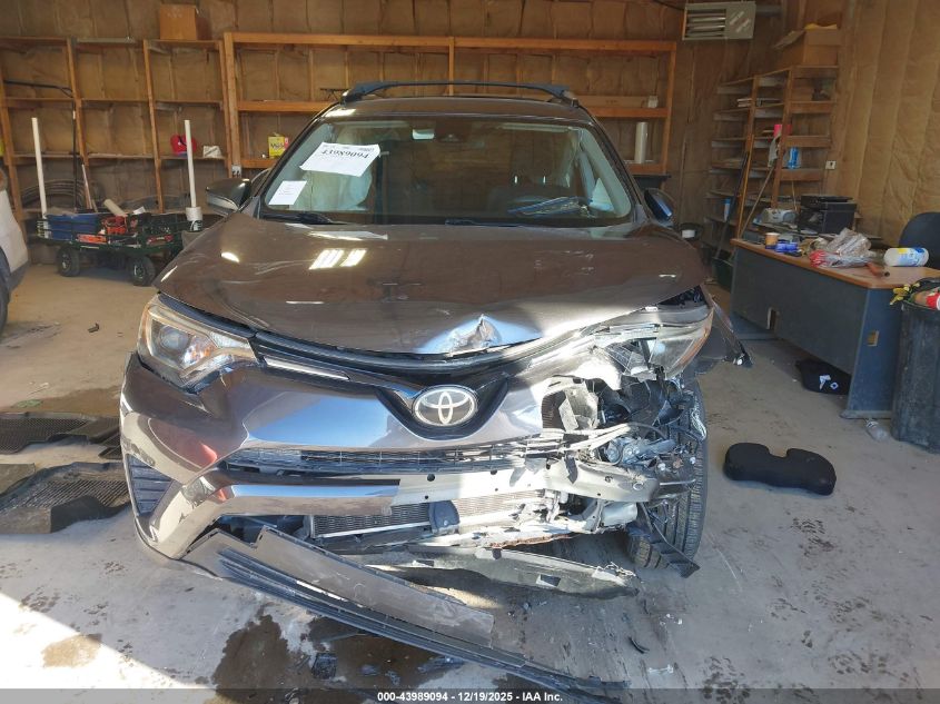 2018 Toyota Rav4 Le VIN: JTMBFREV7JJ724215 Lot: 43989094